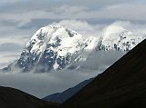 Tibet Kailash 11 Back 11 Phurbi Ghyachu From 35km Before Nyalam After we descended the Tong La, about 35km before Nyalam, a mountain came into view between two hills. I think it�s Phurbi Ghyachu (6658m), just to the west of Nyalam at the bottom of the valley leading to the Southwest face of Shishapangma.